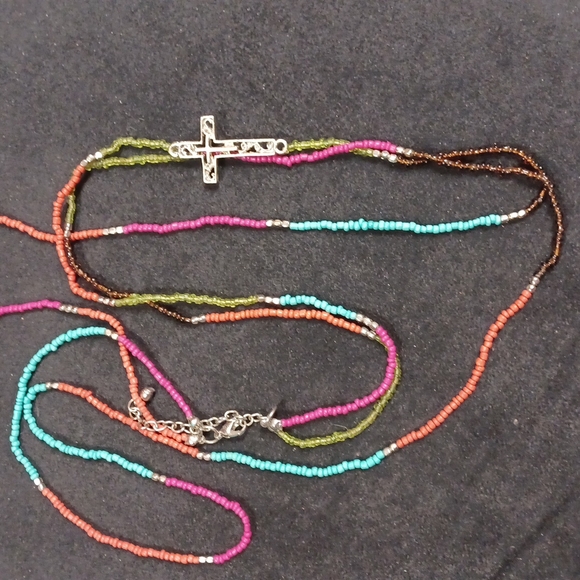 None Jewelry - Multi layered/ colored necklace with boho touch and cross focal point
